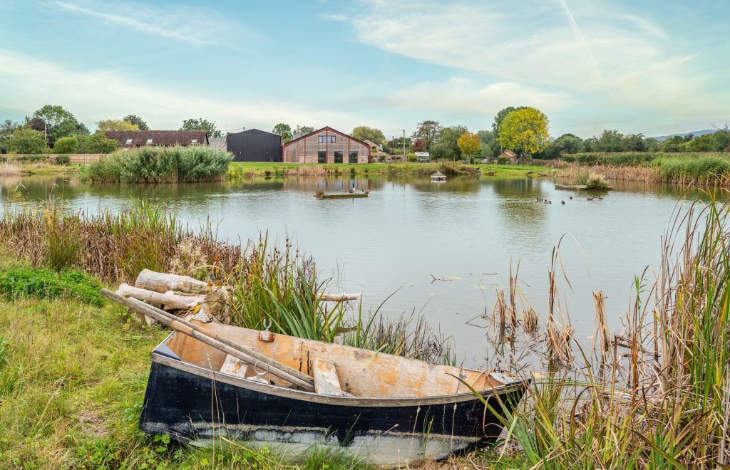 Garden lake at The Grain Barn, Tibberton, Gloucestershire